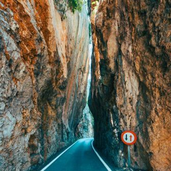 Rock arch on way up Sa Calobra climb Mallorca