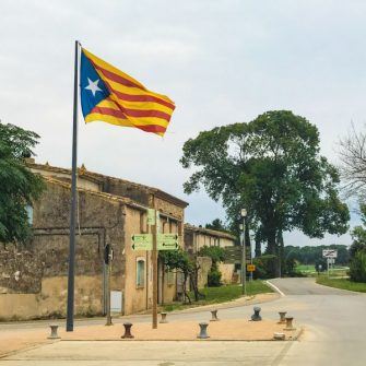 Small village with large Catalan flag flying