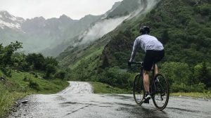 Cyclist cycling to Lac d'Estaing