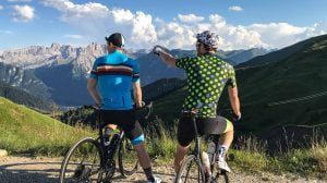 Two men looking into distance wearing stolen goat cycling clothing