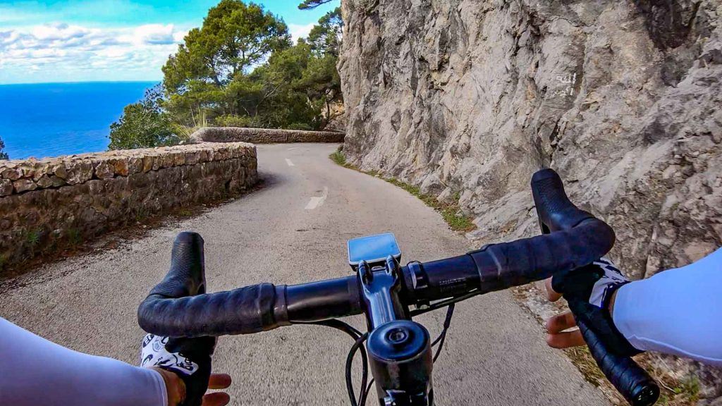 Cyclist descending to Port de Valldemossa Mallorca
