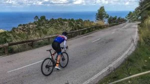 Best Mallorca cycling route with cyclist on road from Andratx Mallorca