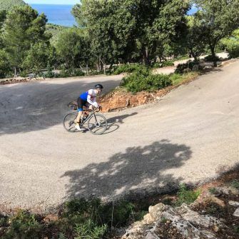 Climbing the ladder of switchbacks on Port des Canonges climb