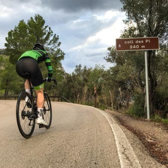 Cyclist climbing col on the Mallorca 312 route