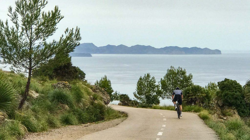 Cyclist on road to Ermita de Betlem, one of Mallorca's best cycling climbs
