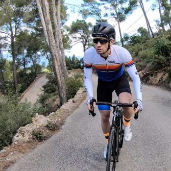 Cyclist on Banyalbufar Port des Canonges climb