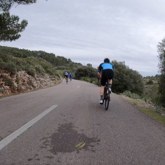 Cyclists on the Mallorca Randa climb