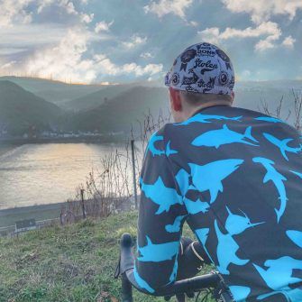 cyclist wearing shark covered stolen goat long sleeve winter cycling jacket