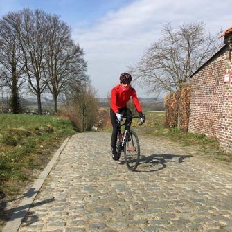 Cyclist on the Koppenberg climb, Flanders, Belgium