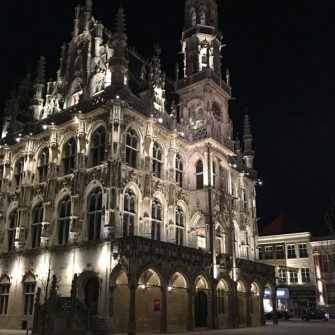 Oudenaarde town hall lit up at night, Belgium