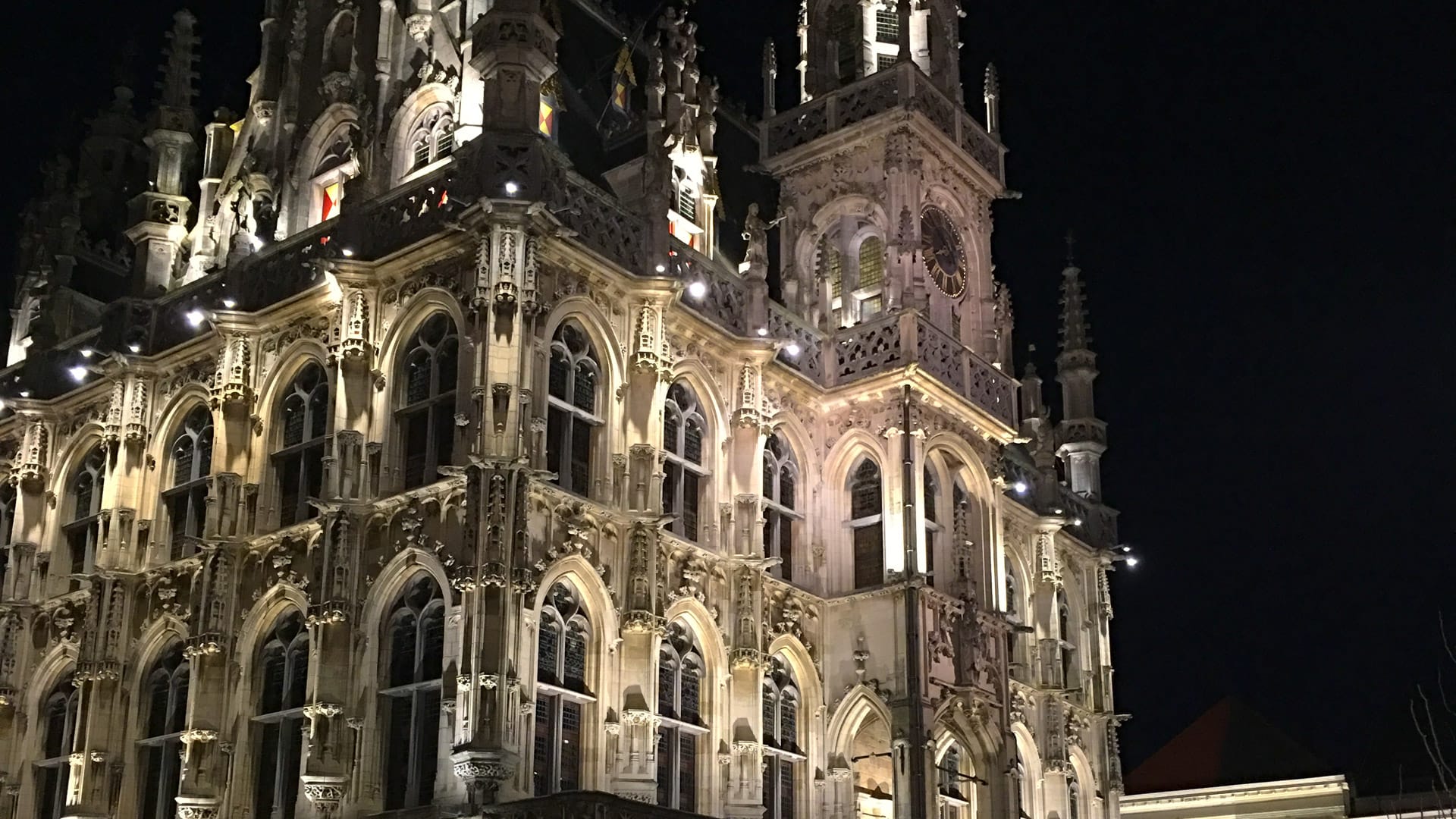 Oudenaarde town hall lit up at night, Belgium