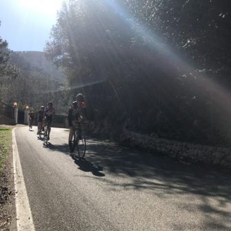 Cyclists riding the roads of mallorca 312 route