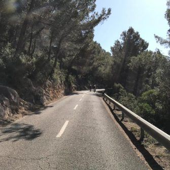 Cyclists climbing Ma1032 towards Galilea