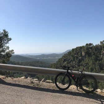 Bike and view on climb towards Galilea