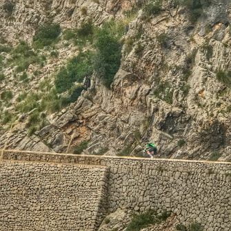 Massive rock walls support the Sa Calobra route