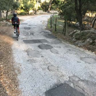 Cyclist climbing Sobremunt, Mallorca