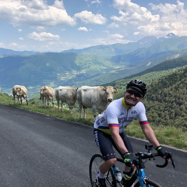 Cyclist on mountain stage of Tour de France route challenge ride