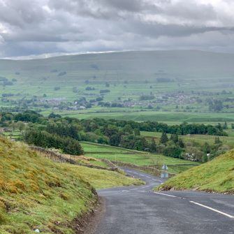 View down to Hawes from the Buttertubs Pass