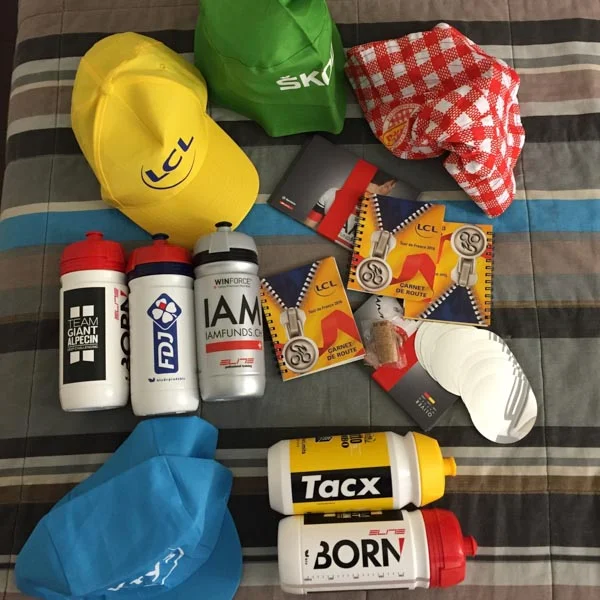 Collection of items picked up on the Tour de France route after watching the Tour in person