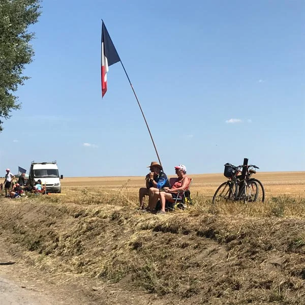Spectators watching the Tour de France in person