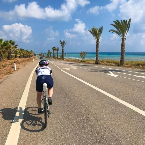 Cyclist riding to Pissouri Bay, Cyprus