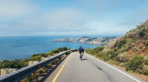 cycling in spain, descending road towards sea