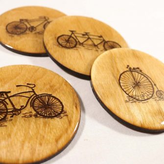 Wooden coasters with bikes on them cycling gift 