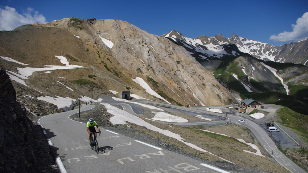Cyclist on the Routes des Grandes Alpes cycle tour