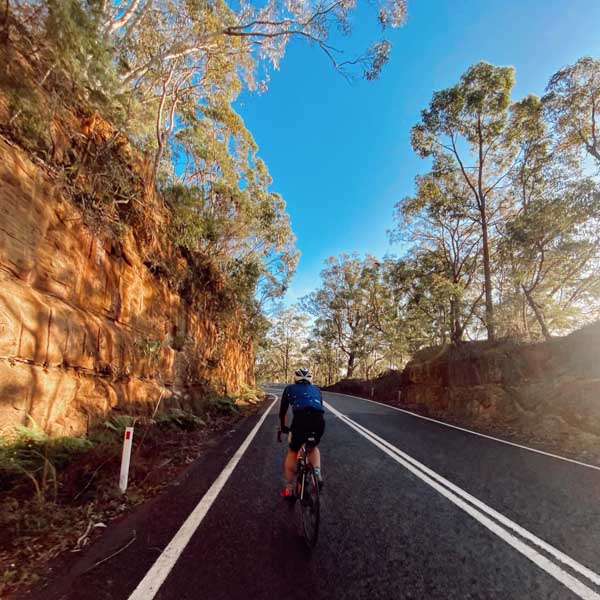 Cycling up Mount White near Sydney Australia