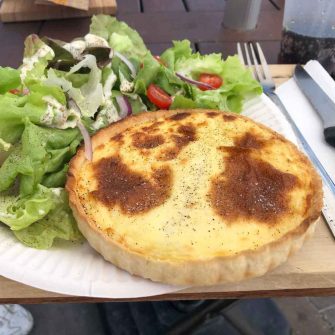 Cheese tart and salad by lake geneva