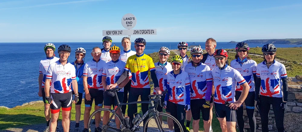Cyclists on Lands End John O Groats attempt