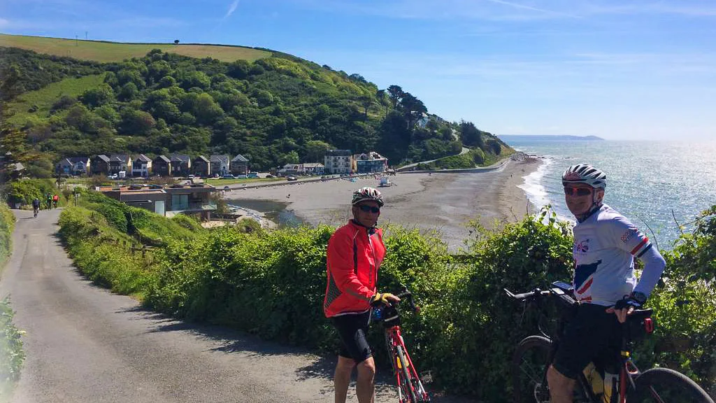 Two cyclists arriving in the cornish town of Seaton on LEJOG