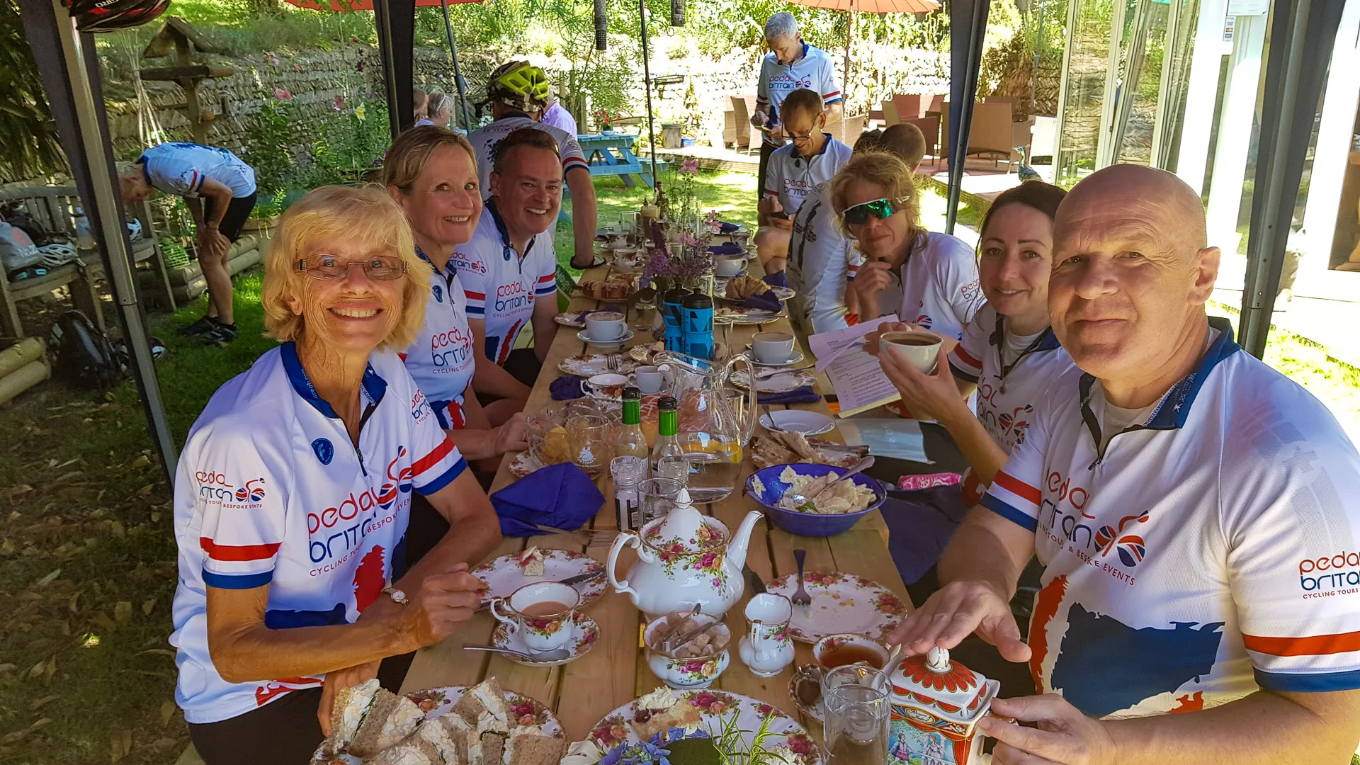 Cyclists enjoy a Cream tea break on the LEJOG cycling trip with Pedal Britiain