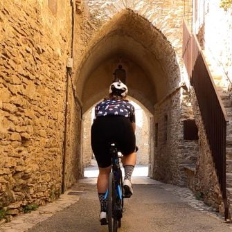 Cyclist in a Spanish medieval town