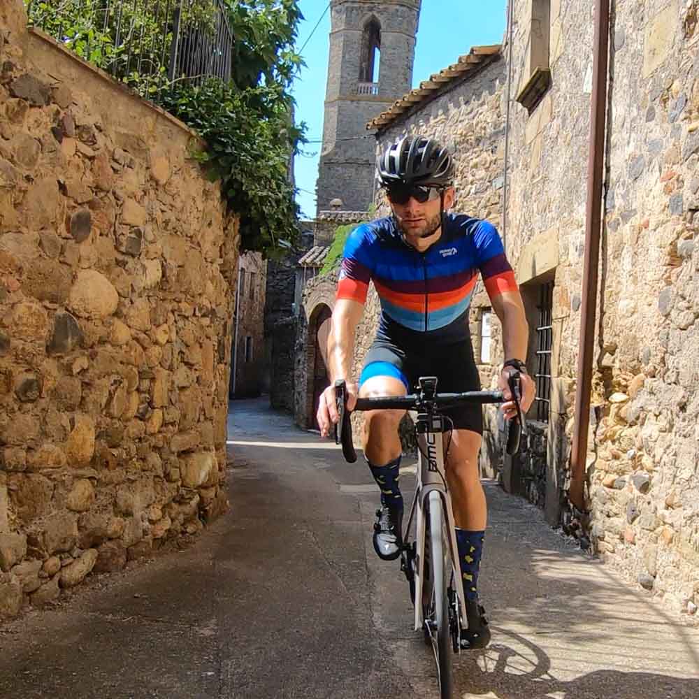 Cycling through a town in Girona Costa Brava