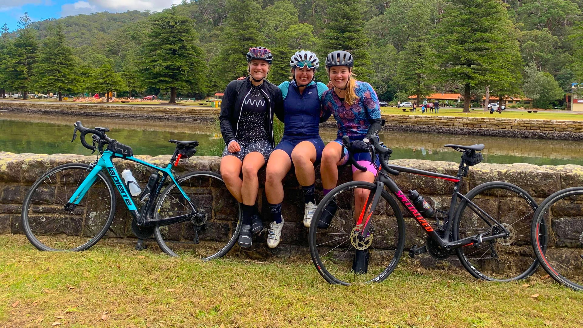 Three cyclists at the bottom of Bobbin Head, Australia