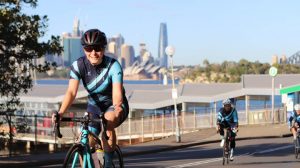 Cycling in Sydney with Sydney Harbour bridge behind
