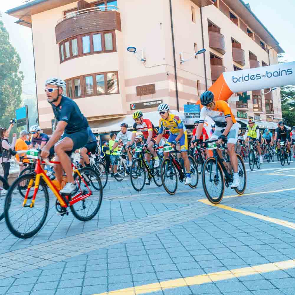 Col de la loze sportive cyclists cycling in the city road