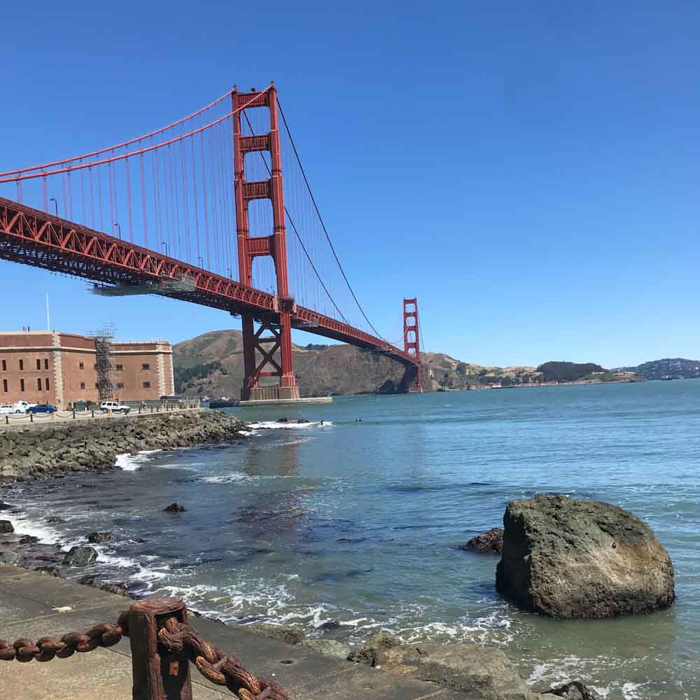 View up to Golden Gate Bridge from Fort Point