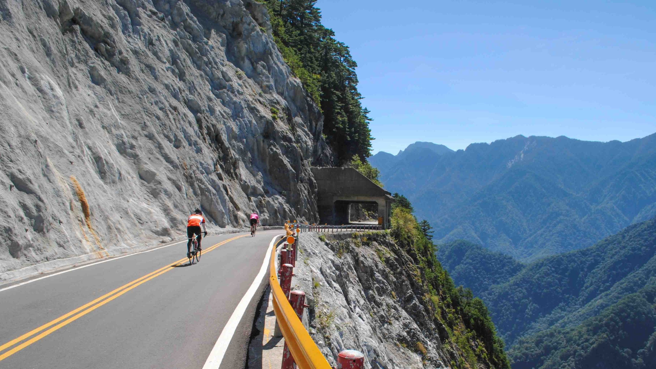 Cyclists on mountain road in Taiwan