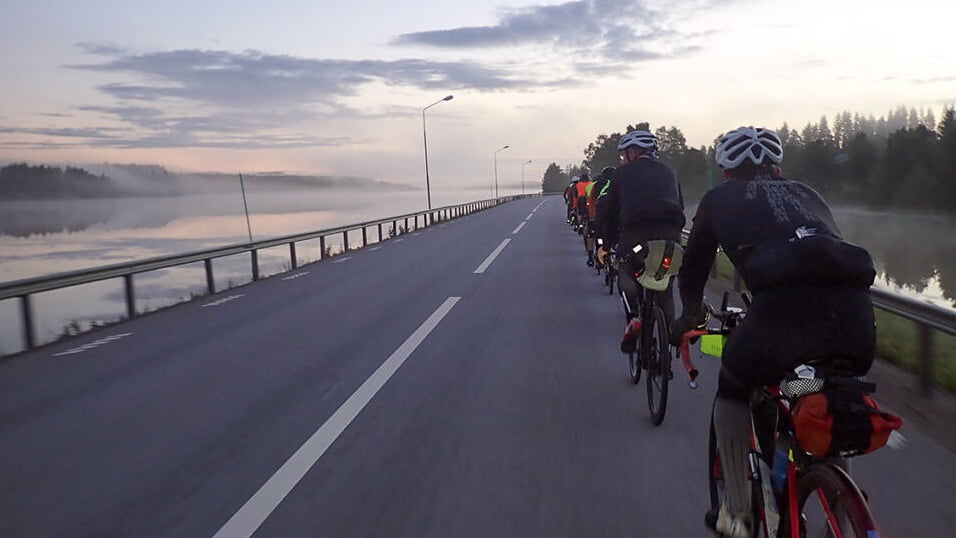 Cyclists starting the Midnight Sun Randonnee cycle route in Scandinavia