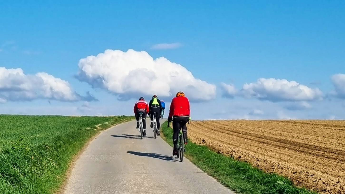 Cyclists in Belgium on an open country road