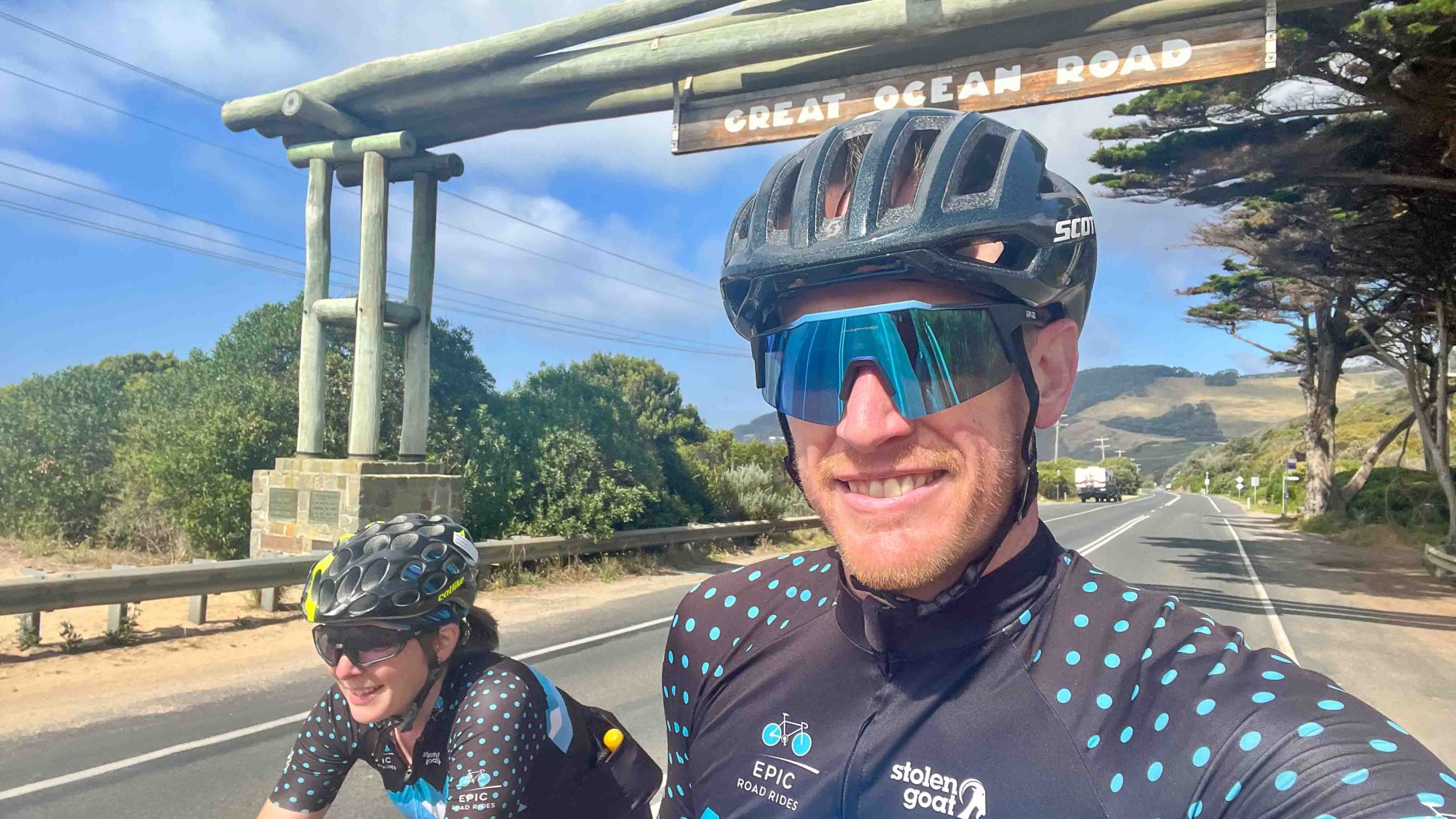 Cyclists at Great Ocean Road arch