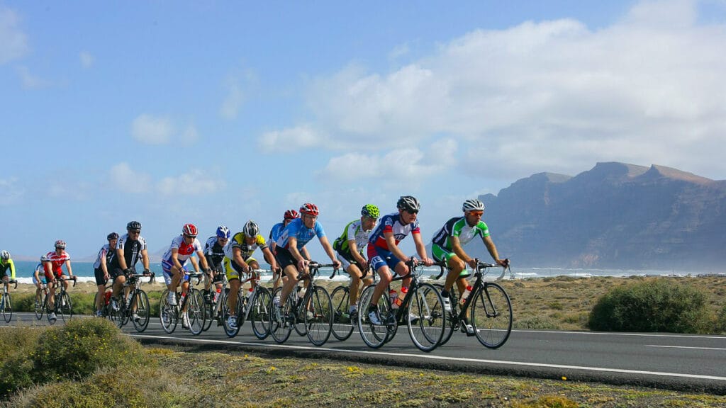 Cycling in Lanzarote with volcano backdrop