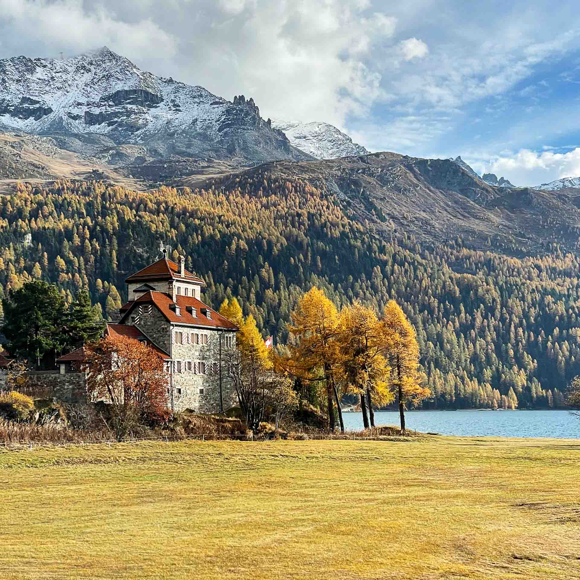 Castle and lake in autumn in Switzerland