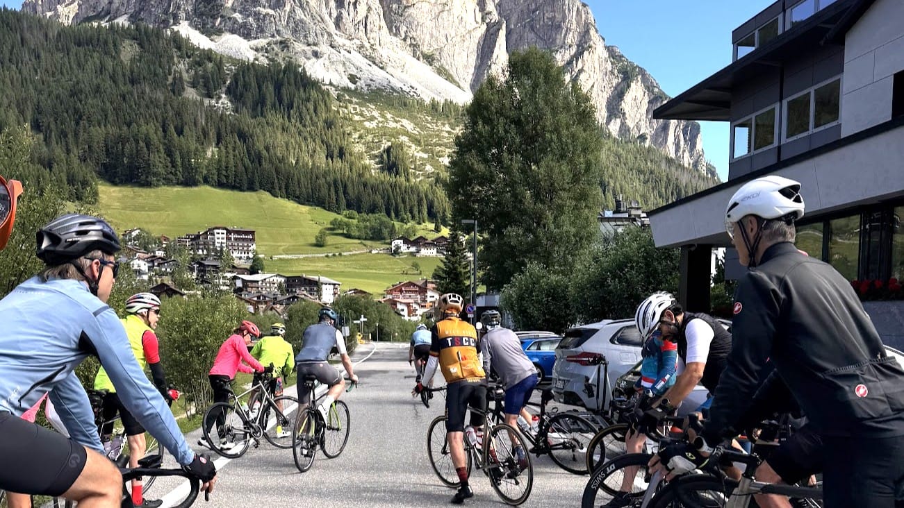 Cyclists getting ready to ride from the hotel in Corvara