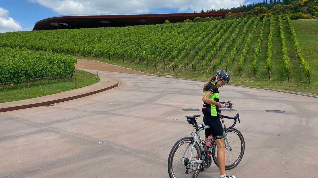 On a cycling tour of Tuscany surrounded by vineyards