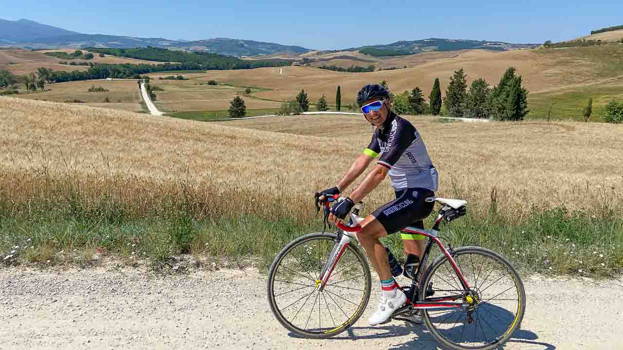 Cyclist in the Val D’Orcia Unesco world heritage area