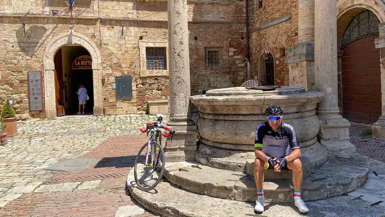 Cyclist in the centre of Montepulciano