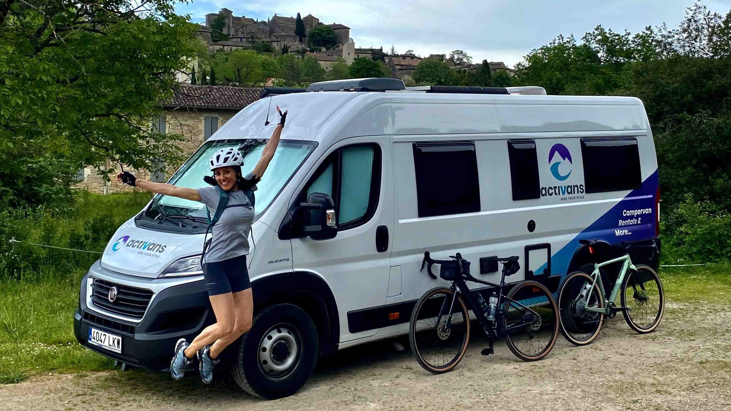 Cyclist with Activan camper van, Girona Costa Brava region